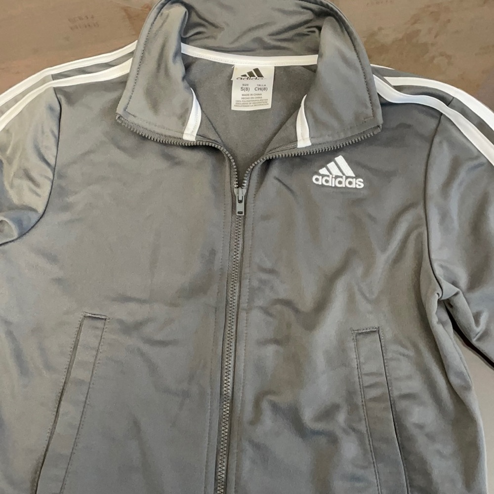 Full zip Adidas light jacket. Excellent condition